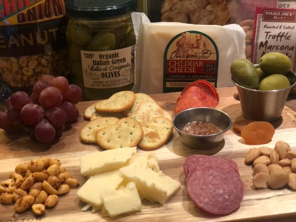 trader joes charcuterie section next to a board