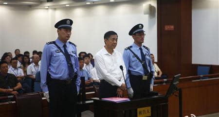 Disgraced Chinese politician Bo Xilai stands trial inside the court in Jinan, Shandong province, August 22, 2013, in this file photo released by Jinan Intermediate People's Court. REUTERS/Jinan Intermediate People's Court/Handout via Reuters/Files