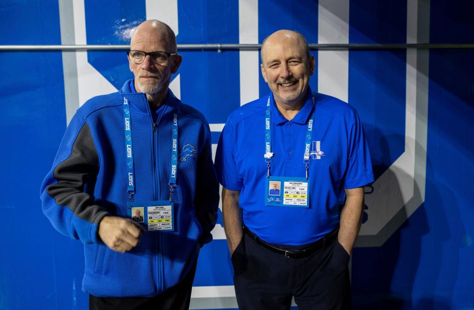 Employees for the Detroit Lions, Dave Cook, left, and Paul Mrozinski, stand at the tunnel entrance during the season's final game against the Minnesota Vikings at Ford Field in Detroit on Sunday, Jan. 7, 2024.