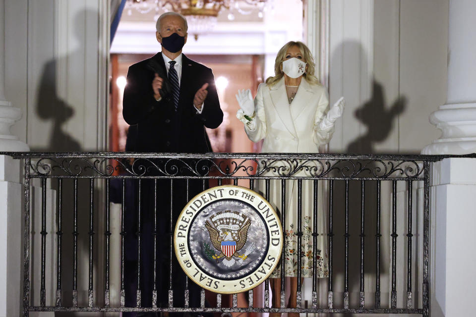 The couple watches the night's fireworks show on the National Mall from the Truman Balcony at the White House. (Photo: Chip Somodevilla via Getty Images)