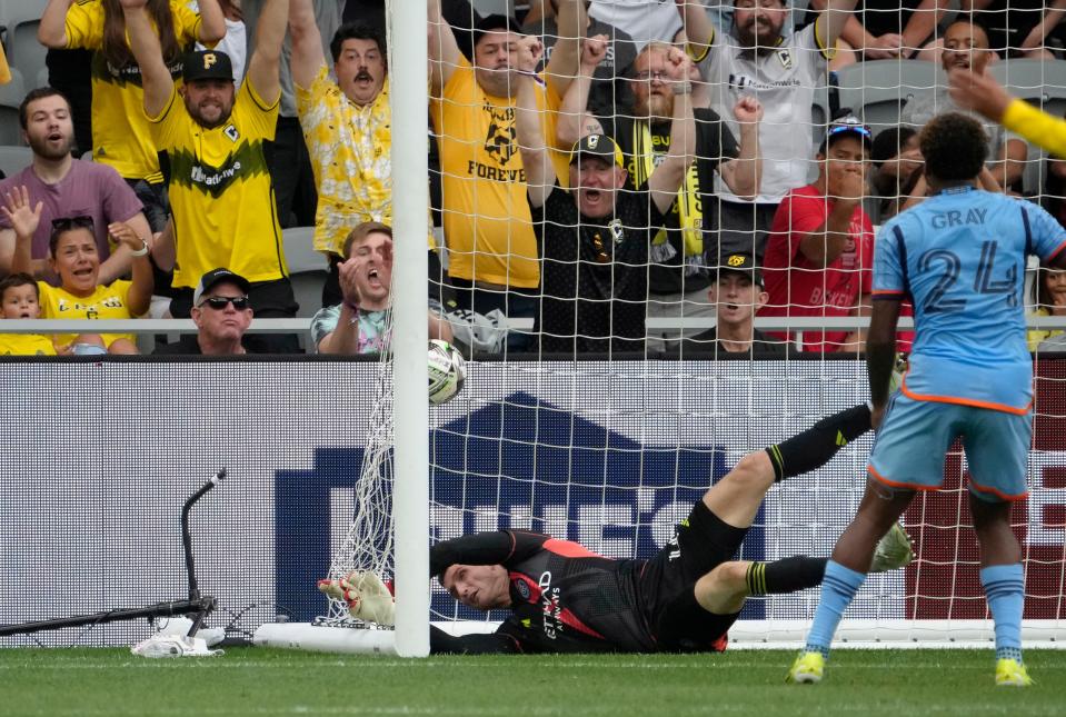 August 17, 2024; Columbus, Ohio, USA; 
New York City goalkeeper Matt Freese (49) misses a ball in the lower corner from Columbus Crew forward Cucho Hernandez (9) for a goal to tie the score 1-1 during the first half of a Leagues Cup quarterfinal match at Lower.com Field.