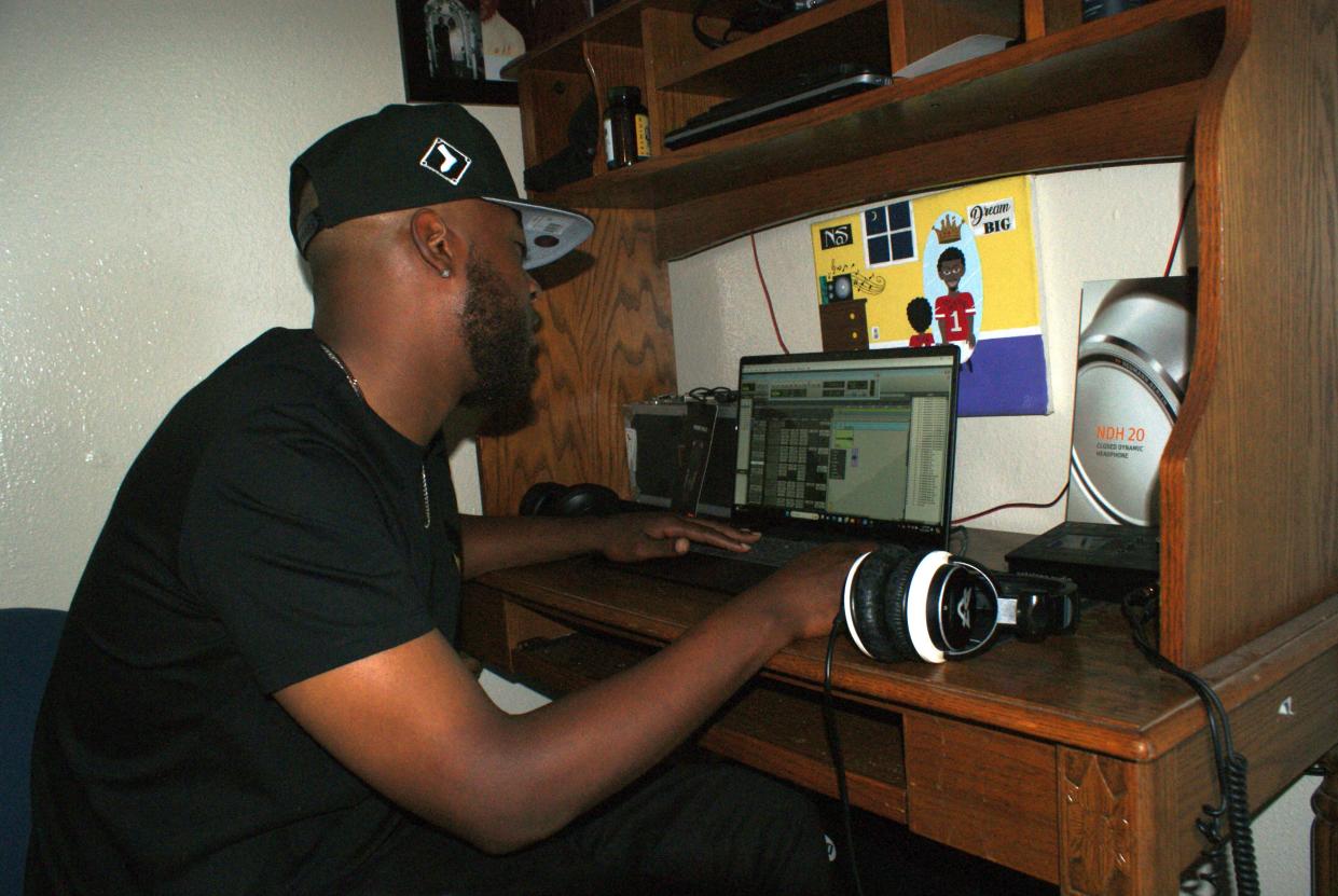 Houma hip hop artist Donald Allen, stage name D-Allen, mixing music in his Houma apartment, Sunday, April 21. Allen sat in tenth place of i-Tunes music store Friday April 12 through Sunday April 14.