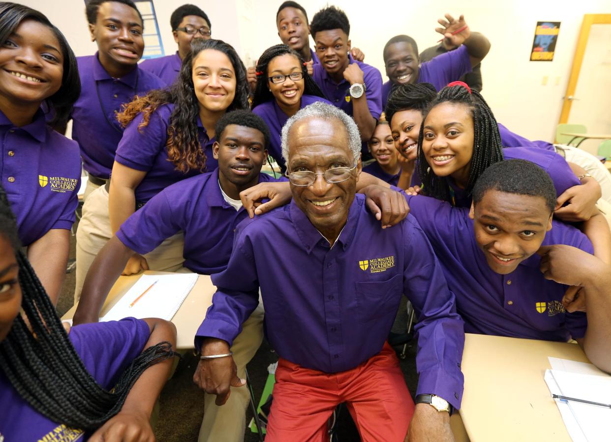 Howard Fuller, center, is pictured with students at Dr. Howard Fuller Collegiate Academy, which he helped found.