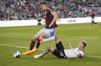 San Jose Earthquakes forward Benji Kikanovic, right, and Colorado Rapids defender Andreas Maxso pursue the ball during the first half of an MLS soccer match Saturday, June 3, 2023, in Commerce City, Colo. (AP Photo/David Zalubowski)