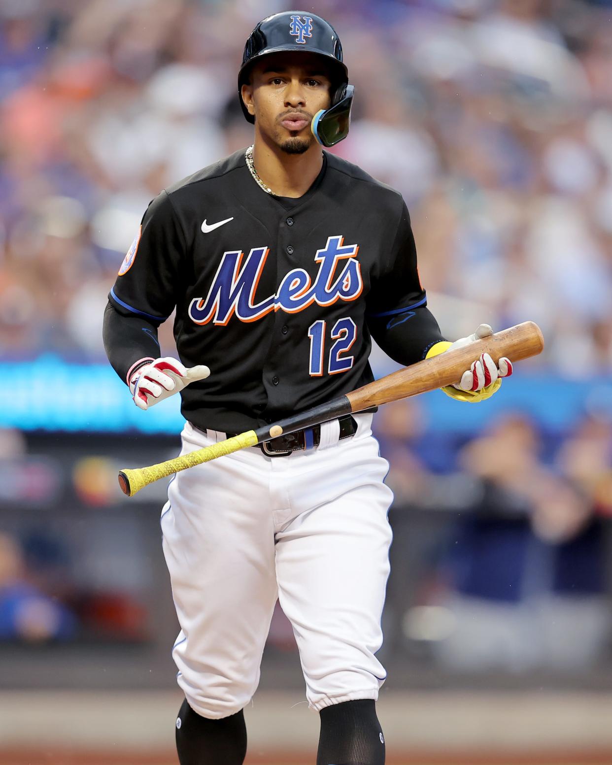 Jul 14, 2023; New York City, New York, USA; New York Mets shortstop Francisco Lindor (12) reacts after striking out during the first inning against the Los Angeles Dodgers at Citi Field. Mandatory Credit: Brad Penner-USA TODAY Sports