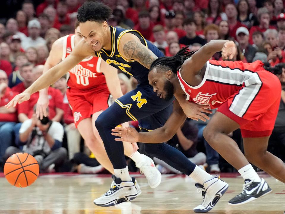 Michigan's Terrance Williams II tries to regain control of the ball during the game against Ohio State at Value City Arena, March 3, 2024 in Columbus, Ohio.