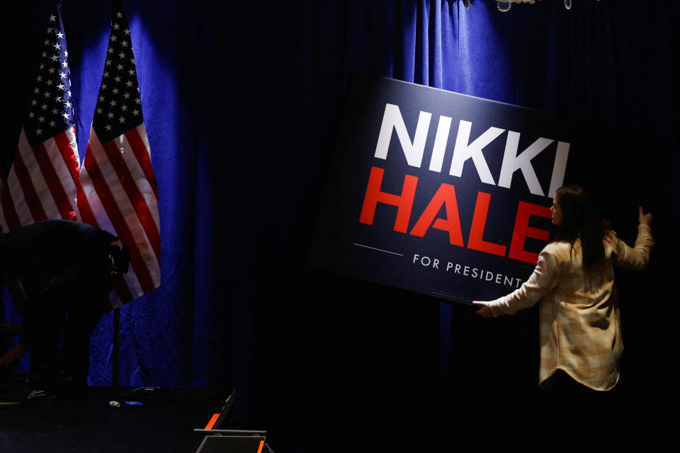 A person removes a sign after Haley spoke at an event for the D.C. Republican Party in Washington, D.C., on March 1.