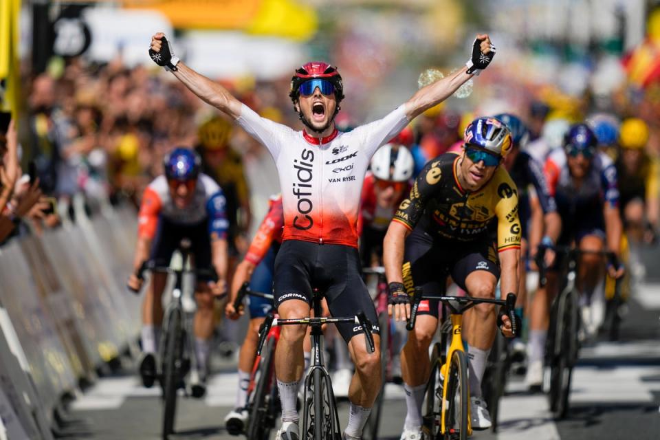 Victor Lafay celebrates winning the second stage of the Tour de France (AP)