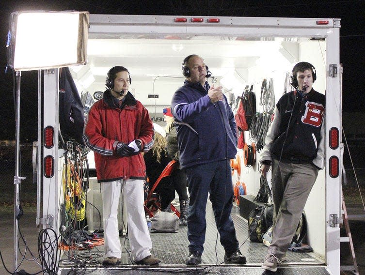 RSN commentators (from right to left) Dominic Santina (play-by-play), Chuck Vondra (color), and Roger Coates (color) call a Boyne City football playoff game against Oscoda from the RSN trailer.