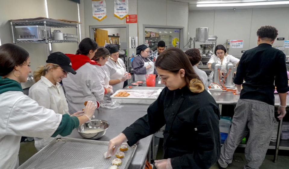 Culinary students at the Cranston Area Career and Technical Center prepare holiday sweets in December.