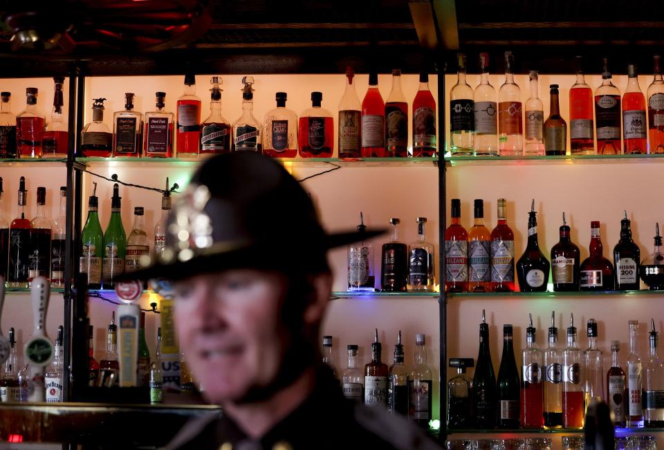 Utah Highway Patrol Maj. Steve Salas stands inside Bar X during a press conference urging drivers to add a sober ride to their winter holiday plans in Salt Lake City on Thursday, Dec. 14, 2023. | Laura Seitz, Deseret News