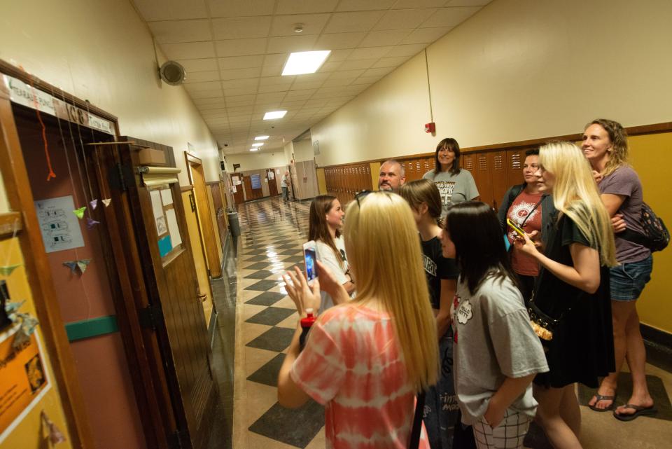 Music, colorful lights and a decorated doorway to a classroom at Topeka High School are seen during the tour for soon-to-be enrolled Ukrainian students Tuesday afternoon.