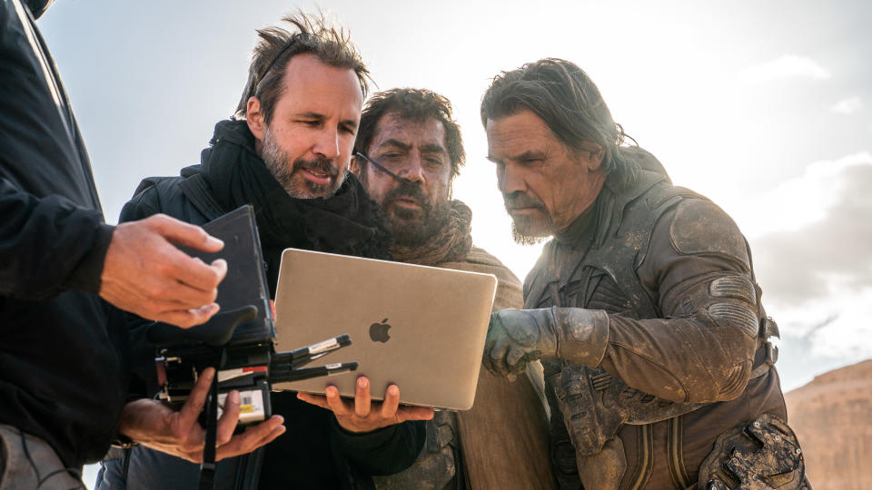 Denis Villeneuve with Javier Bardem and Josh Brolin on the set of Dune 2. (Warner Bros Pictures)