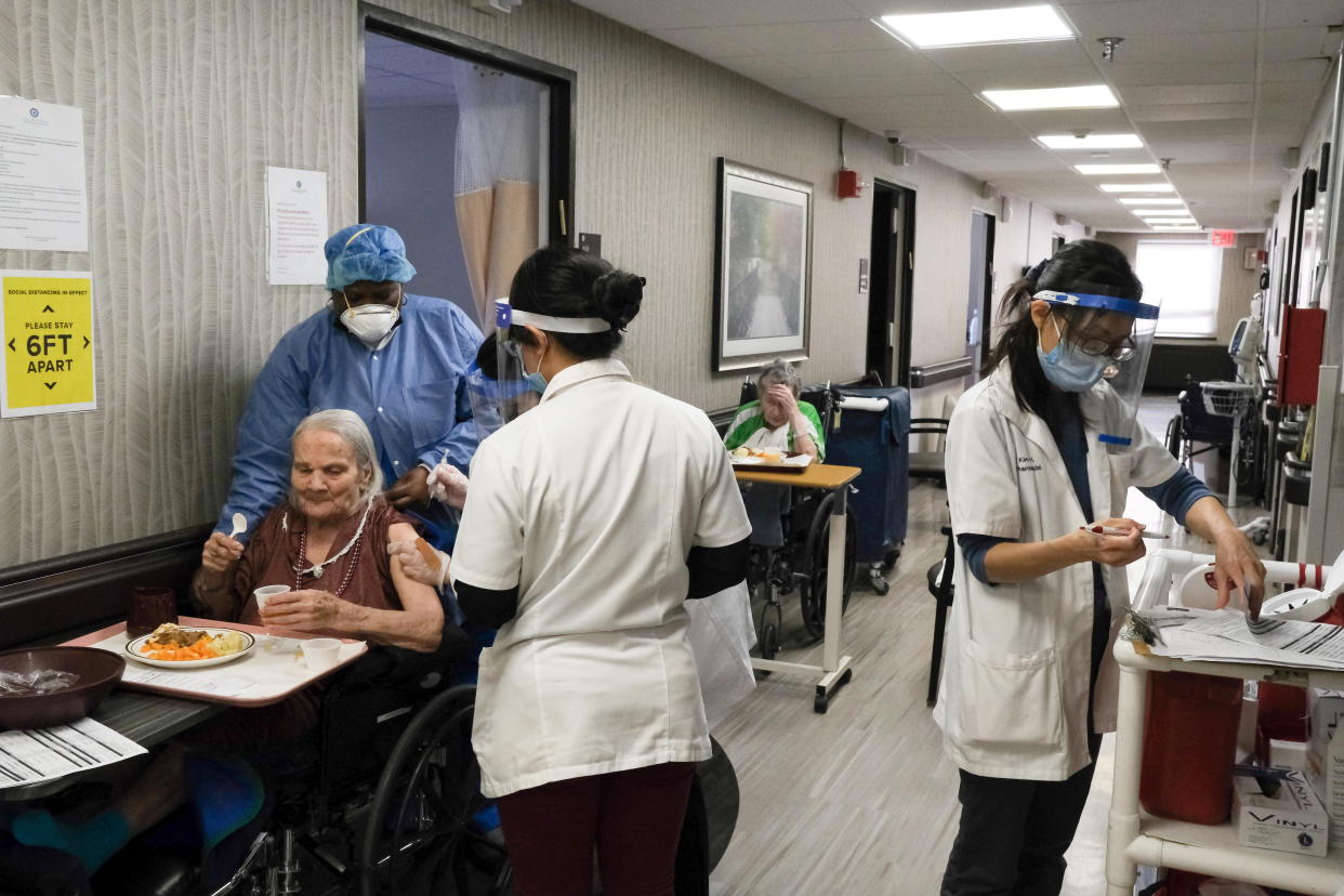 Nursing home residents receive a shot of the coronavirus disease (COVID-19) vaccine at King David Center for Nursing and Rehabilitation, a nursing home facility, in Brooklyn's Bath Beach neighborhood in New York City, U.S. January 6, 2021.  REUTERS/Yuki Iwamura