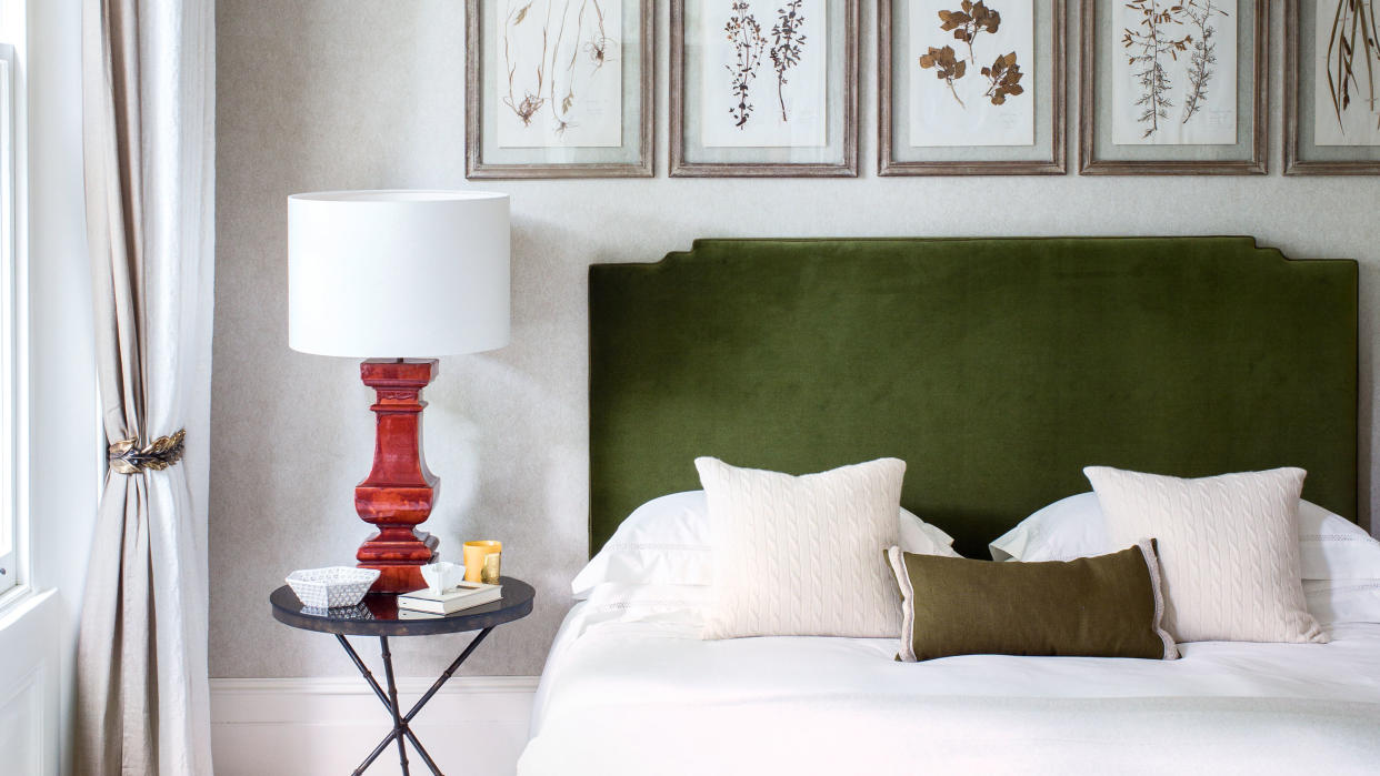  green headboard in neutral bedroom 