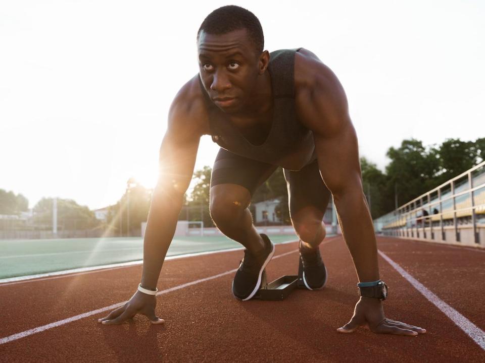 man running jogging sprinting track