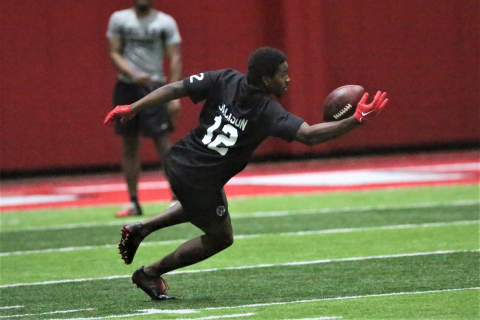 Ball State football wide receiver Jayshon Jackson makes a one-handed catch during the program's Pro Day at the Scheumann Family Indoor Practice Center on Monday, March 27, 2023.