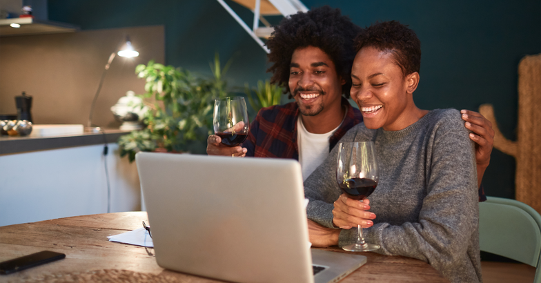 couple drinking wine on a video call