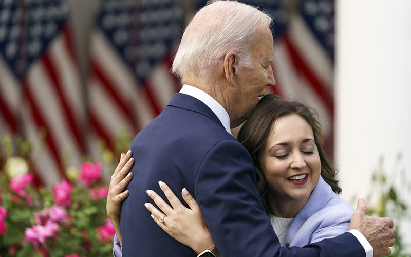 President Biden hugs Union High School math teacher Rebecka Peterson