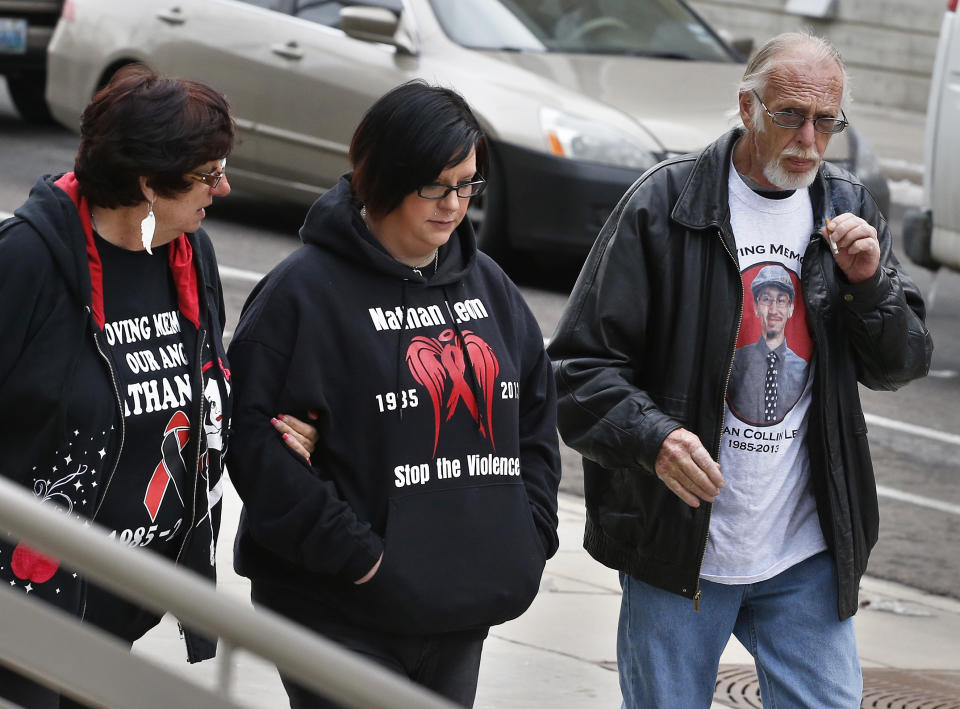 Katie Barnhart-Leon, center, the widow of slain Denver computer technician and pizza deliveryman Nathan Leon, walks with her mother Bernadette Alness, left, and father Marty Alness, as they arrive for a sentencing hearing for a woman who pleaded guilty to buying the handgun used to kill Leon and the director of Colorado Prisons, at the Federal Courthouse, in Denver, Monday March 3, 2014. Stevie Marie Anne Vigil was sentenced to more than two years in prison and three years supervision for buying the handgun for Evan Ebel, a parolee and member of a white supremacist prison gang. (AP Photo/Brennan Linsley)