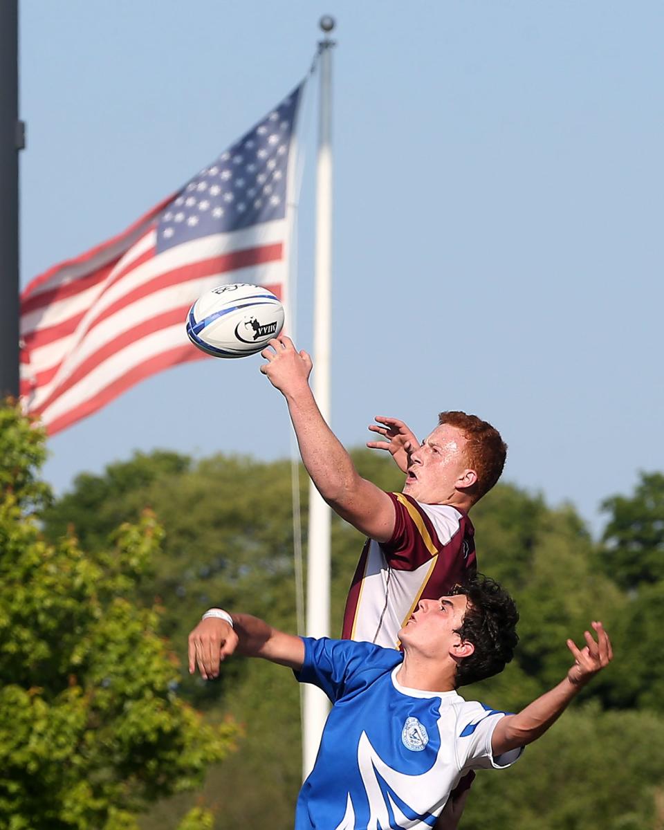 Weymouth's Christian Laenen battles Braintree's Austin Colantonio for the rugby on a line out during second half action of their Round of 8 game against Braintree in the Division 2 state tournament at Legion Field in Weymouth on Thursday, June 1, 2023.