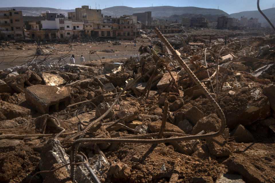 FILE - A view of the destruction after flooding in Derna, Libya, on Sept. 16, 2023. Libya’s chief prosecutor said Monday Sept. 25, 2023 he ordered the detention of eight current and former officials pending his investigation into the collapse of two dams earlier this month, a disaster that sent a wall of water several meters high through the center of a coastal city and left thousands of people dead. (AP Photo/Ricardo Garcia Vilanova, File)