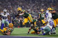 <p>Ty Montgomery #88 of the Green Bay Packers dives into the end zone to score a touchdown during the second quarter against the Dallas Cowboys in the NFC Divisional Playoff game at AT&T Stadium on January 15, 2017 in Arlington, Texas. (Photo by Tom Pennington/Getty Images) </p>