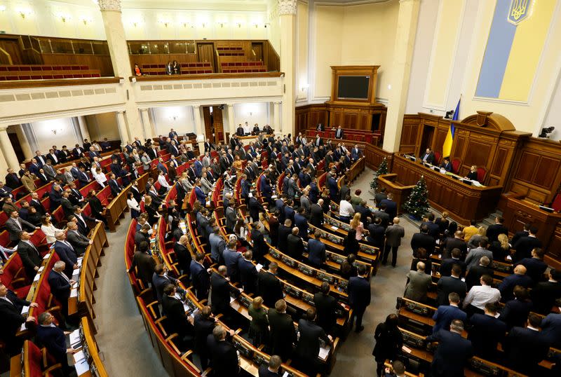 Ukrainian lawmakers attend a session of parliament in Kiev