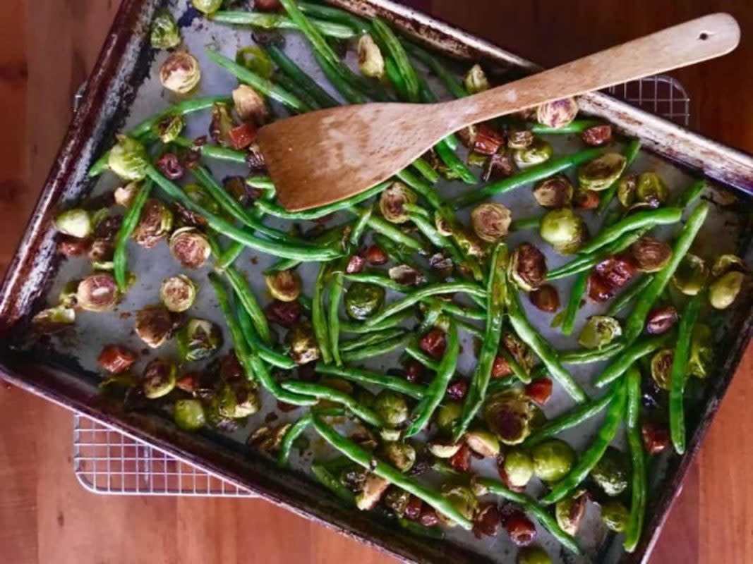 <p>Courtesy of paleoglutenfreeguy.com</p><p>If you can't decide between green beans and Brussels sprouts, maybe roast up a combo of the two!</p><p><strong>Get the recipe: <a href="https://paleoglutenfreeguy.com/roasted-green-beans-brussel-sprouts-dates-balsamic-vinegar/" rel="nofollow noopener" target="_blank" data-ylk="slk:Roasted Green Beans and Brussels Sprouts;elm:context_link;itc:0;sec:content-canvas" class="link rapid-noclick-resp">Roasted Green Beans and Brussels Sprouts</a></strong></p>