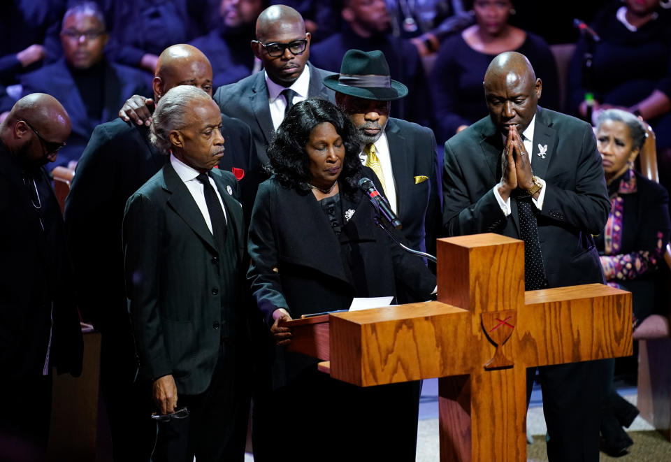 Flanked by Sharpton and her husband, Rodney Wells, RowVaughn Wells speaks during the funeral service for her son Tyre Nichols.