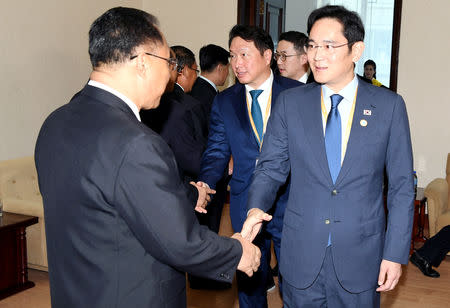 FILE PHOTO - Samsung group Vice Chairman Jay.Y Lee and SK Group Chairman Chey Tae-won meets with North Korea’s deputy prime minister for economic affairs Ri Ryong Nam, in Pyongyang, North Korea, September 18, 2018. Pyeongyang Press Corps/Pool via REUTERS