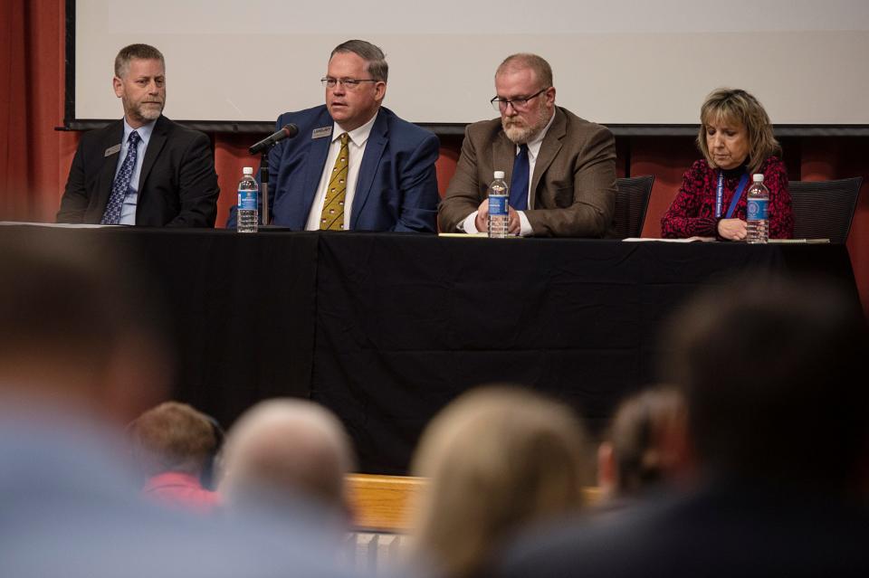 In a March 10 press conference, speakers projected hope and promised aid for more than 1,000 shocked workers and their families. From left, David Garrett, Workforce Development Director at Southwestern Commission, Nathan Ramsey, Executive Director at Land of Sky Regional Council, Doug Burchfield, Dean of Workforce and Industry at Haywood Community College, and Teresa Allison Economic Services Director for Haywood County Health and Human Services.