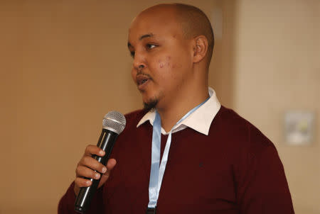 Abdalla Dahir speaks during a workshop on bringing stability and prosperity to Somalia, in this undated photograph, at an unknown location. Adam Smith International/Handout via REUTERS THIS IMAGE HAS BEEN SUPPLIED BY A THIRD PARTY. NO RESALES. NO ARCHIVES.