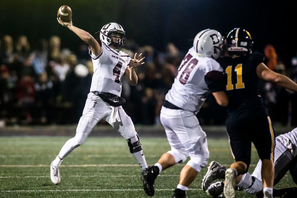 Dowling Catholic quarterback Jaxon Smolik throws a pass against Southeast Polk during a Class 5A state football quarterfinal on Nov. 5, 2021, in Pleasant Hill.