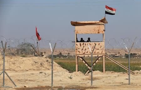 Iraqi guards are seen at the Iraqi-Syrian border, in Al Qaim