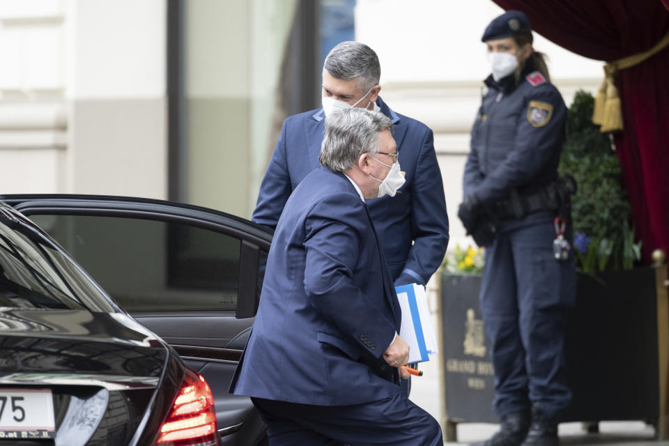 Russia's Governor to the International Atomic Energy Agency (IAEA), Mikhail Ulyanov, arrives at the Grand Hotel Wien where closed-door nuclear talks with Iran take place in Vienna, Austria, Tuesday, April 6, 2021. Foreign ministry officials from the countries still in the accord, the so-called Joint Comprehensive Plan of Action, are meeting in Vienna to push forward efforts to bring the United States back into the 2015 deal on Iran's nuclear program. (AP Photo/Florian Schroetter)