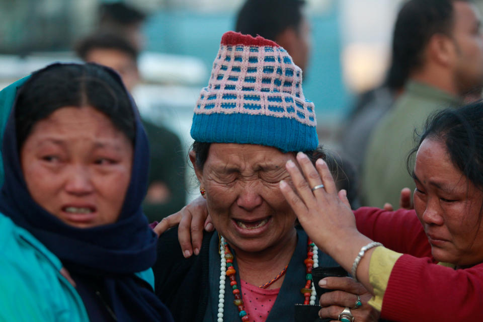 Family members of the Nepali mountaineering guides who were killed in an avalanche on Mount Gurja react at the Teaching hospital in Kathmandu on October 14, 2018. Picture taken October 14, 2018. (REUTERS/Sulav Shrestha)