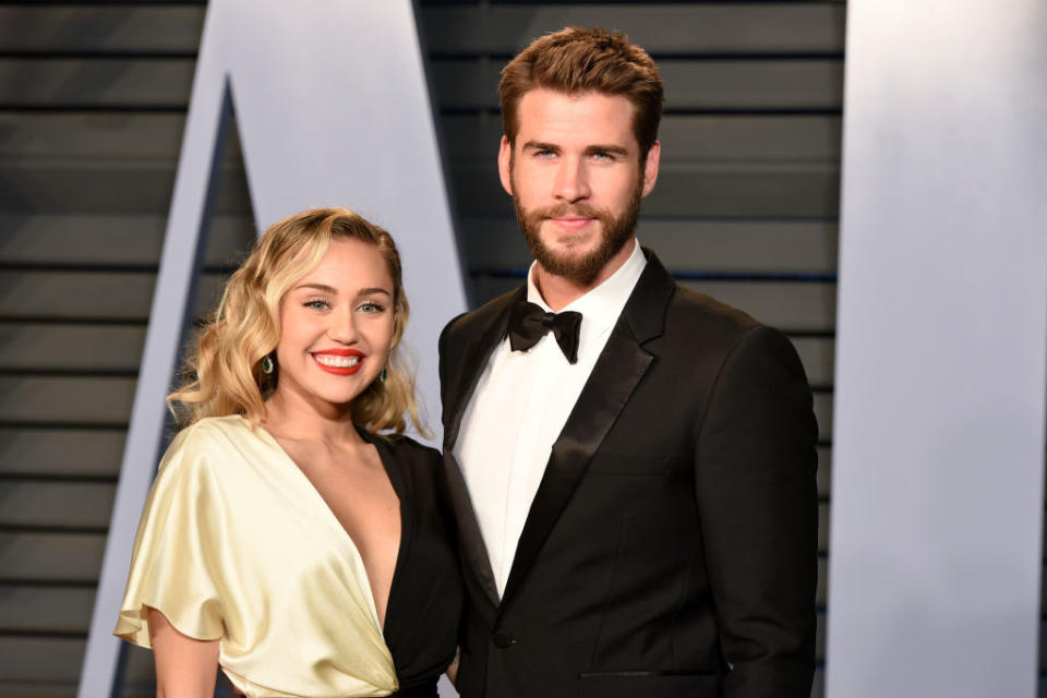 Miley Cyrus and Liam Hemsworth attend the 2018 Vanity Fair Oscar Party March 4, 2018, in Los Angeles. (Photo: Presley Ann/Patrick McMullan via Getty Images)