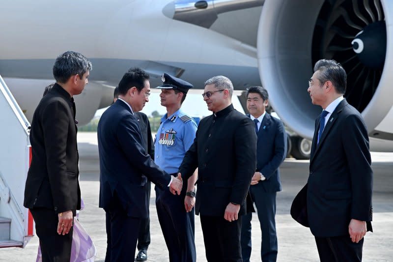 Japan's Prime Minister Fumio Kishida (Second from left) accompanied by his wife, Yuko, arrives in New Delhi on Friday. Photo by G20 India