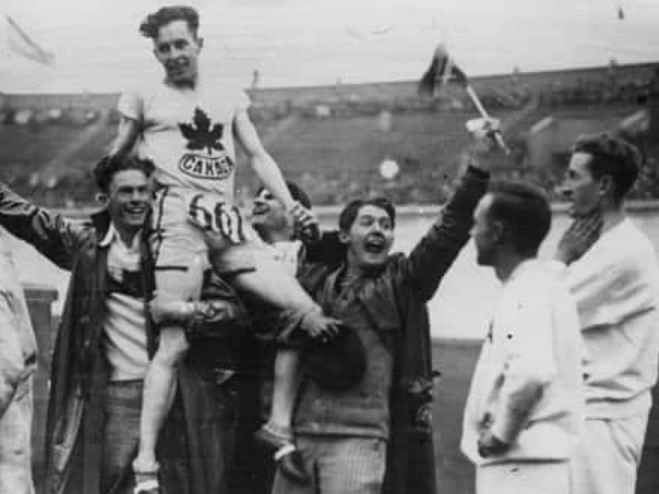 Vancouver sprinter Percy Williams won gold for Canada in the 100 and 200 metres at the 1928 Olympic Games in Amsterdam.   ((Central Press/Getty Images) - image credit)