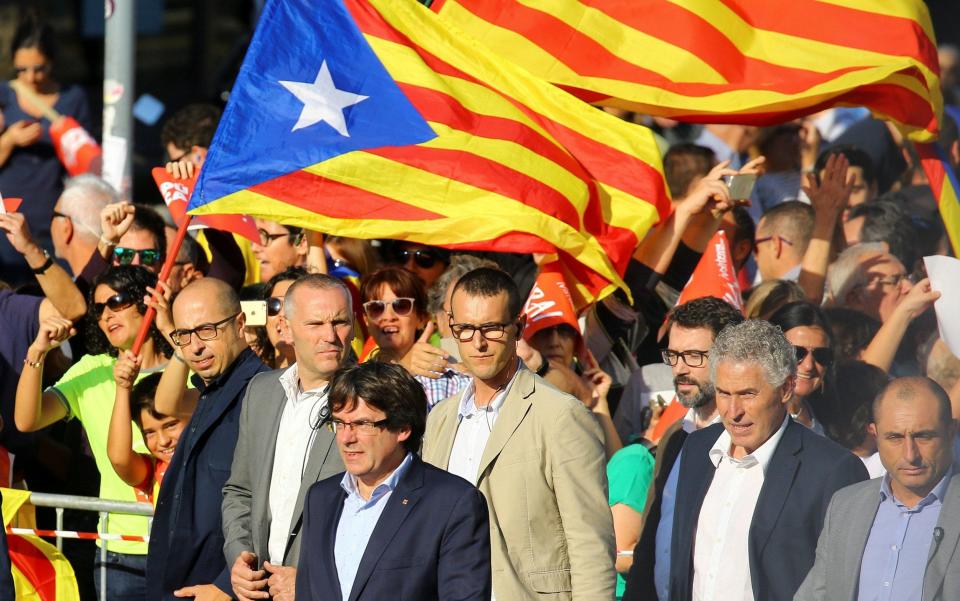 Catalan President Puigdemont attends a pro-independence demonstration on Saturday - REUTERS