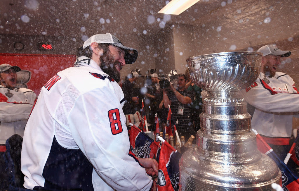 Washington Capitals star Alex Ovechkin spends some quality time with the Stanley Cup. (Getty Images)