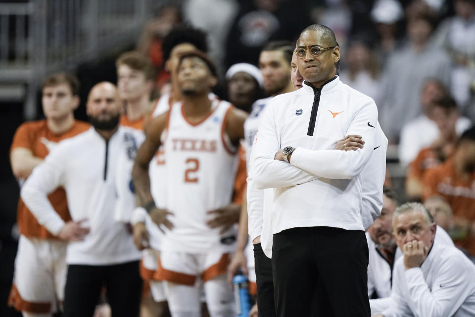 Texas head coach Rodney Terry watches during their loss against Miami in an Elite 8 college basketball game in the Midwest Regional of the NCAA Tournament Sunday, March 26, 2023, in Kansas City, Mo. (AP Photo/Charlie Riedel)