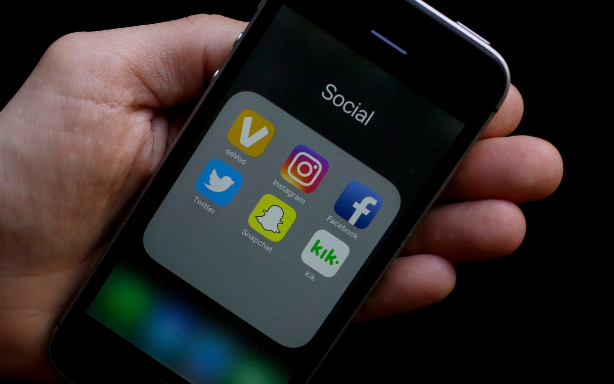 The Royal Society for Public Health is calling on the public to reduce their social media use for a month  - AP