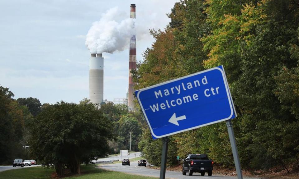 Emissions spew from a large stack at the coal-fired Morgantown generating station in Newburg, Maryland.