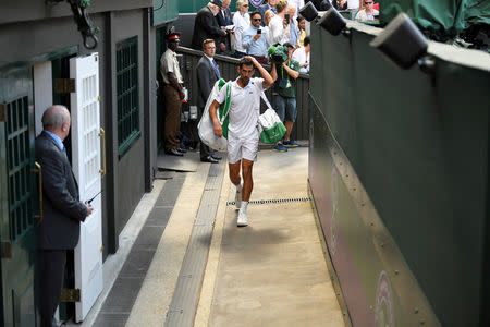 Tennis - Wimbledon - All England Lawn Tennis and Croquet Club, London, Britain - July 11, 2018 Serbia's Novak Djokovic after winning his quarter final match against Japan's Kei Nishikori REUTERS/Tony O'Brien