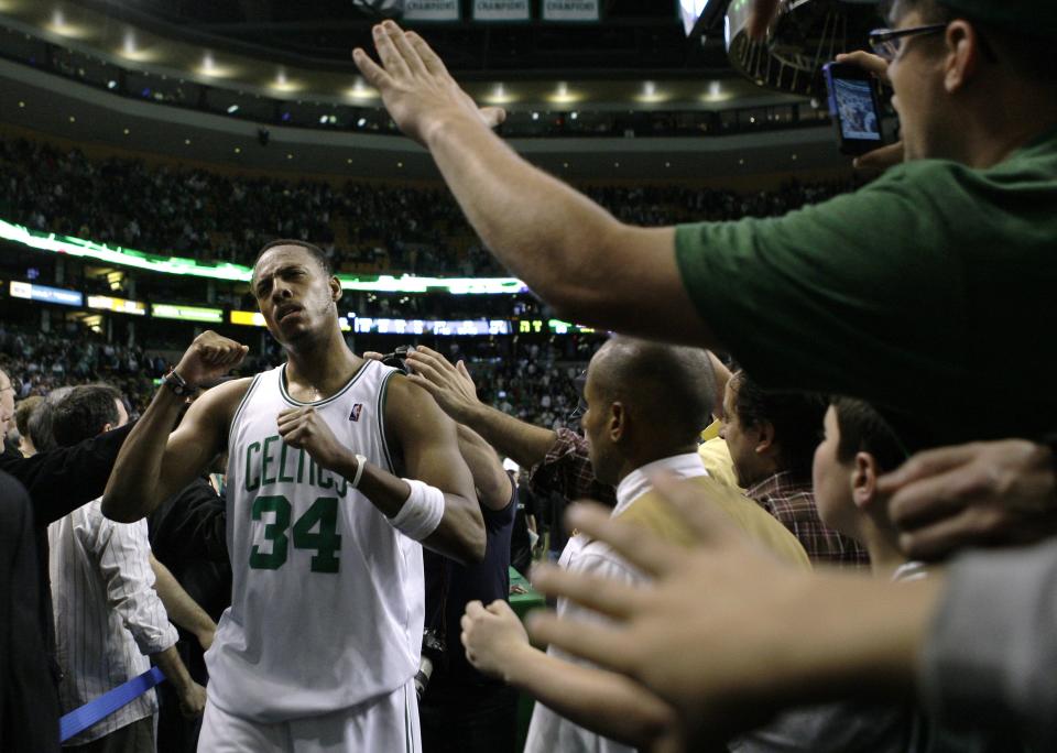Boston Celtics forward Paul Pierce pumps his fist as he is congratulated by fans after the Celtics beat the <a class="link " href="https://sports.yahoo.com/nba/teams/miami/" data-i13n="sec:content-canvas;subsec:anchor_text;elm:context_link" data-ylk="slk:Miami Heat;sec:content-canvas;subsec:anchor_text;elm:context_link;itc:0">Miami Heat</a> 96-86 in Game 5 of a first-round NBA basketball playoff series, in Boston on Tuesday, April 27, 2010. The Celtics eliminated the Heat from the playoffs. AP Photo/Charles Krupa