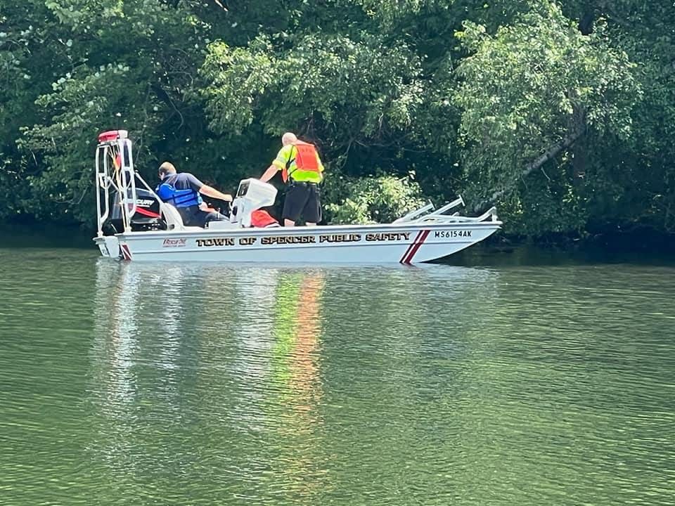 SPENCER - Public safety personnel work from a boat on Lake Whittemore at Luther Hill Park after the body of a missing woman was found in the water Saturday afternoon, August 6, 2022.