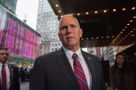 U.S. Vice President-elect Mike Pence arrives at Trump Tower in New York City, U.S., January 3, 2017. REUTERS/Stephanie Keith