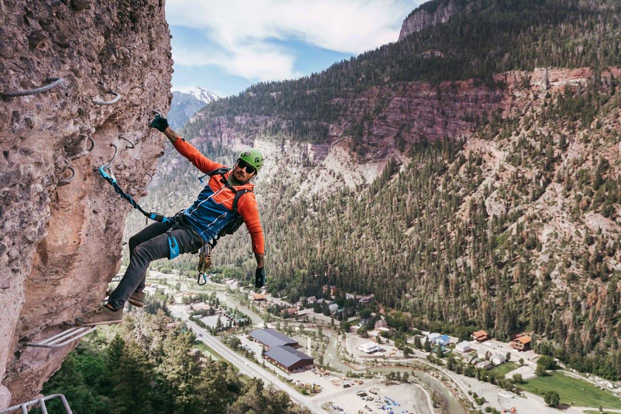 Hanging off the side of Gold Mt. Expedition Ferrata